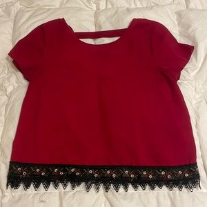 Red blouse with lace trim